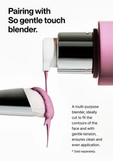 Makeup brush with pink liquid being applied, labeled 'So gentle touch blender' on a white background.