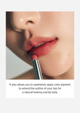 Close-up of a person applying pink lipstick with a text overlay about color pigment application.