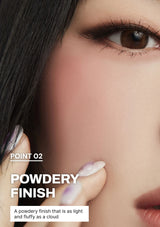 Close-up of a person's eye with a powdery finish text overlay