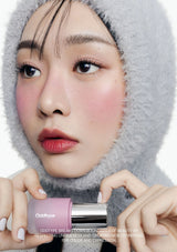 Person holding a pink and silver product with text overlay