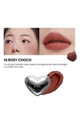 Lipstick with a heart-shaped design on a white background, featuring a close-up of lips wearing the lipstick.