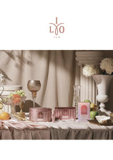 Decorative table setting with 'ILO' products and elegant decor elements.