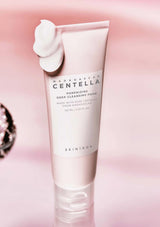 Skinfoo Madagascan Centella cleansing foam tube on a pink background