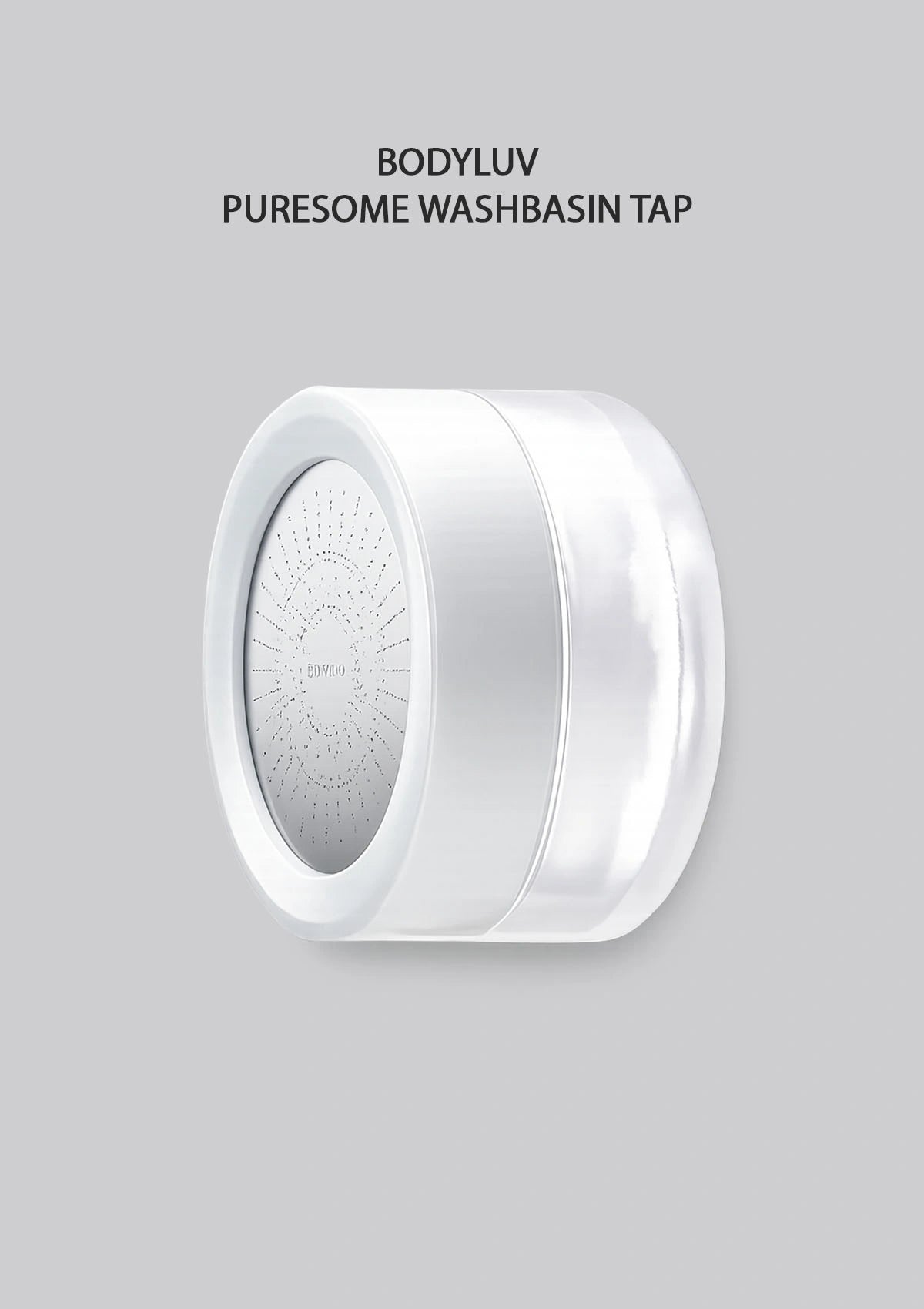 A white cylindrical body luv puresome washbsin tap shown on a solid gray background with text above reading 'BODYLUV PURESOME WASHBSIN TAP'.