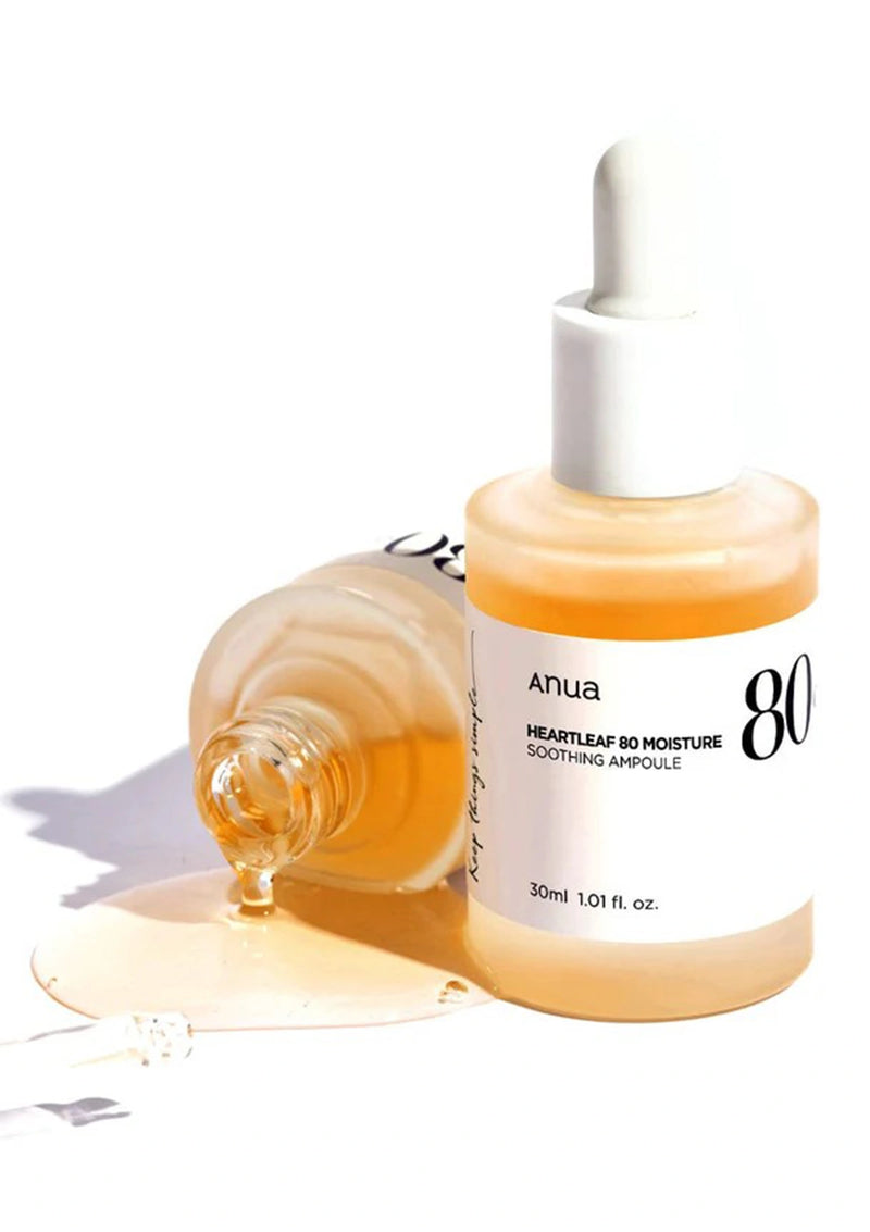 Anua skincare ampoule with dropper on a white background