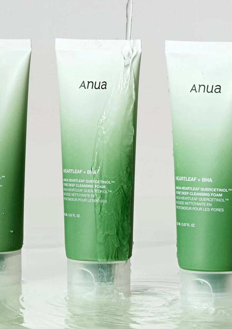 Three green skincare products with 'Anua' branding on a white background