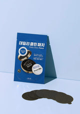 Blue packaging of Daily Clean Patch with black patches on a light blue background