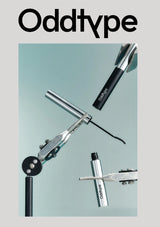 Eyelash curler and mascara with 'Oddtype' branding on a light blue background