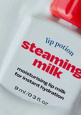 Lip potion labeled 'steaming milk' on a white background