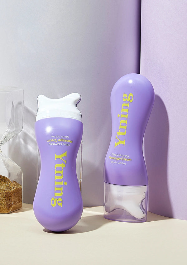 Two purple bottles with white caps labeled 'Yuning' on a light background.