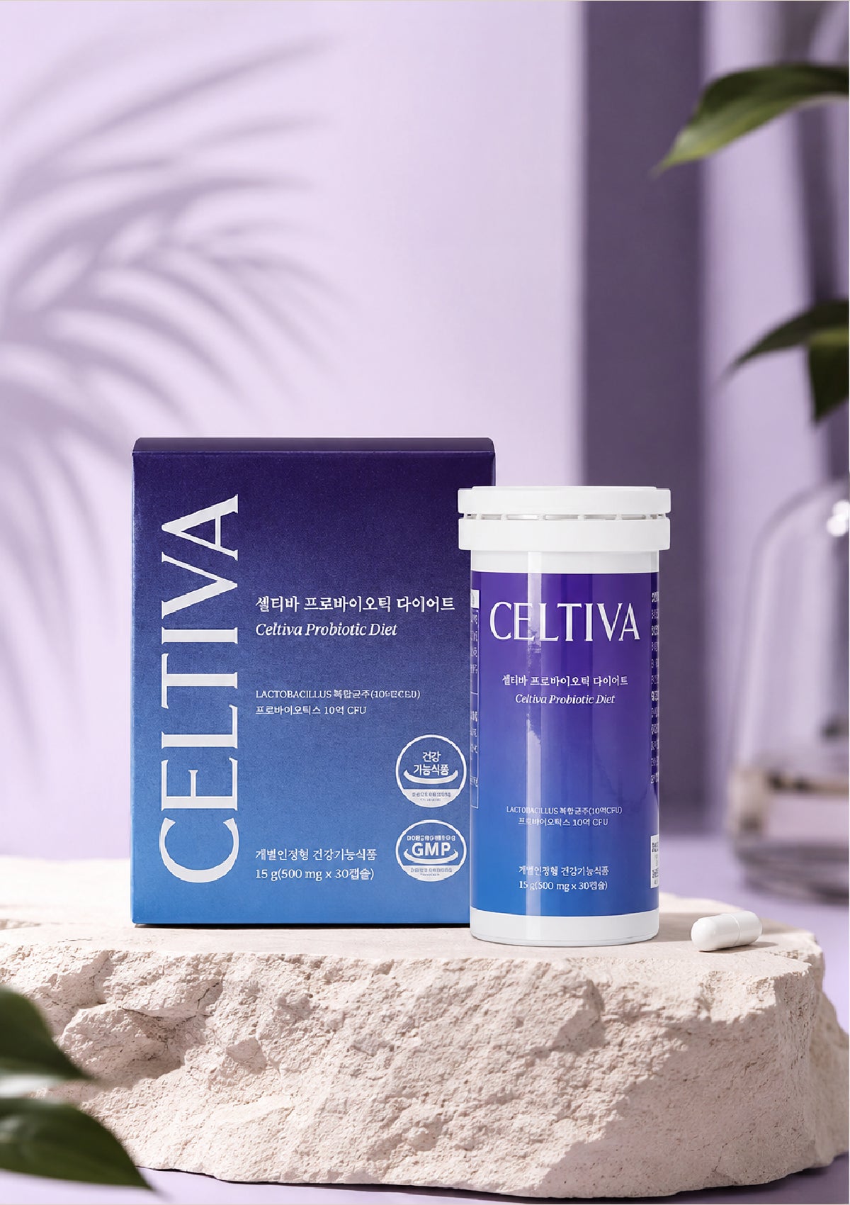 Celtiva Cellular Pro-Defense Kit, featuring a blue and white product box and a matching cylindrical bottle, displayed on a textured stone slab with a soft purple background.