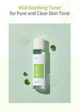Klorane mild soothing toner bottle with packaging on a light green background