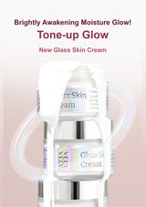 Glass skin cream bottle with text on a pink background