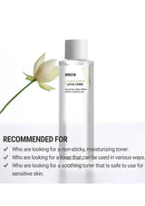 Bottle of Revectin Lotus Toner with a white flower on a light gray background