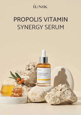 Propolis Vitamin Synergy Serum bottle with natural elements on a beige background