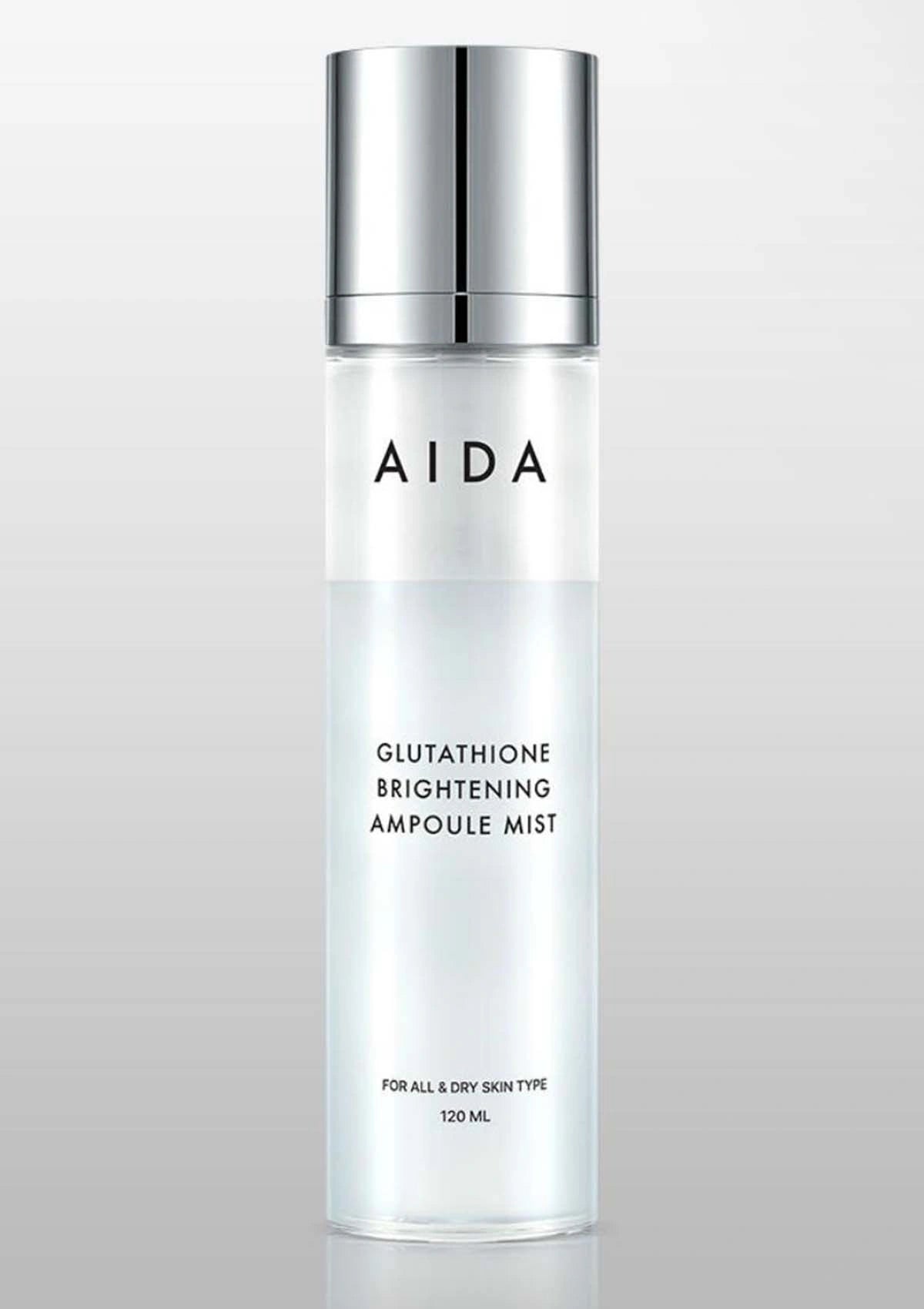 AIDA Glutathione Brightening Ampoule Mist bottle on a gray background