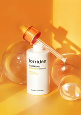 Torriden Cellmazing Ampoule bottle with dropper on an orange background