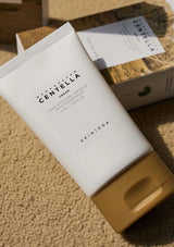 Skincare product with 'Korean Centella' text on a textured surface