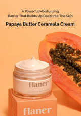 Papaya Butter Ceramela Cream jar with a papaya on an orange background
