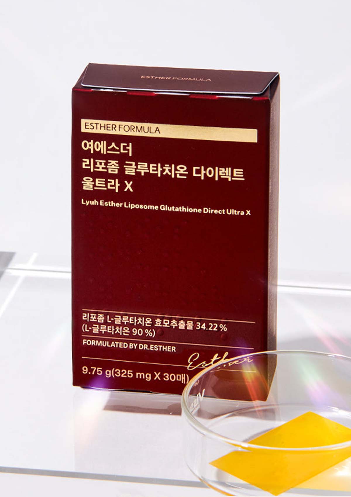 Packaging of Esther Formula Lyuh Esther Liposome Glutathione Direct Ultra X, showing a box and a pack with a yellow dissolving film strip.