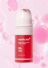 Medicube pink collagen bubble serum bottle on a pink background with bubbles