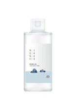 Skincare bottle with a blue label on a white background