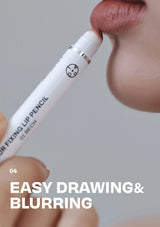 Lip pencil being used on a person's lips with a gray background