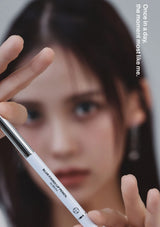 Person holding a makeup pencil with text overlay
