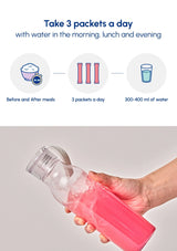 Packaging of Shake Baby Pink Formula Diet Water Mix, showing a pink box with individual sachets of the powder mix.
