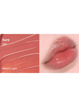 Lipstick swatch and application on a lip with '#Warm Light' color code.