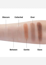 Swatches of different brown shades on a person's arm with labels.
