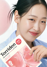Woman holding a Torriden facial mask package with a close-up of her face in the foreground.