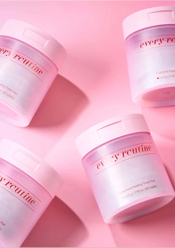 Multiple jars of 'every routine' on a pink background