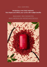 Red body treatment stick with red seeds on a beige background, surrounded by green leaves.