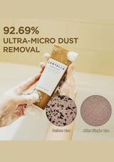 Product packaging with text about ultra-micro dust removal, held by a hand with a before and after comparison on a beige background.