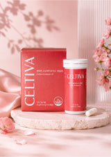 Celtiva Cellulose Probiotic supplement shown with its red product box and matching red bottle on a stone slab, styled with pink flowers and soft pink fabric in a clean studio setup.