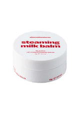 White lip balm container with red text on a white background