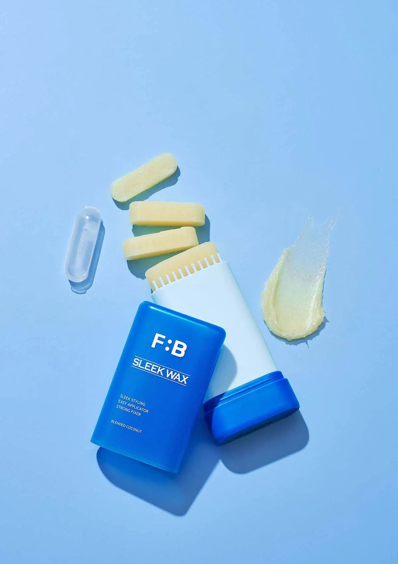 F:B Sleek Wax product with applicator on a blue background