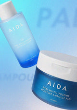 AIDA skincare products on a gradient blue background