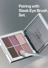 Makeup palette with brush and 'OGG' branding on a gray background