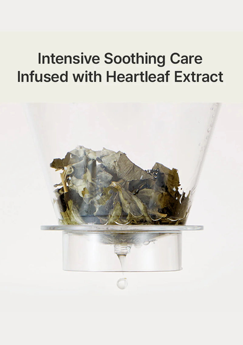 Glass container with heart-shaped stones labeled 'Intensive Soothing Care Infused with Heartleaf Extract' on a white background.