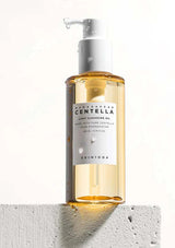 Skincare bottle labeled 'Centella' on a light background