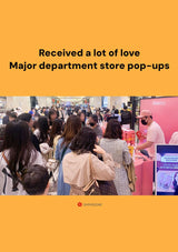 People at a major department store pop-up event with a yellow border and Shinsegae logo.