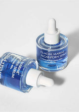 Two bottles of Glacial Marine Algae-PDRN Serum on a light gray background