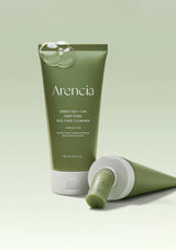 Green tube of Arencia rice cake cleanser on a light green background