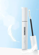 Cosnori mascara with brush on a light blue background