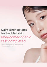 Advertisement for a daily toner suitable for troubled skin with a close-up of a person's face.