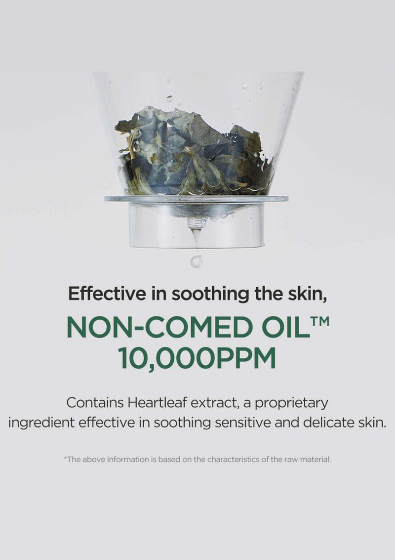 Glass container with rock-like material on a white background, featuring text about non-comed oil and heartleaf extract.