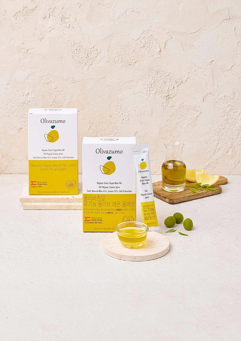 Olivazumo lemon products including boxes, jars, and a glass on a light background