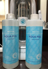Two bottles of Aqua Peel solution with a pump bottle in the background.